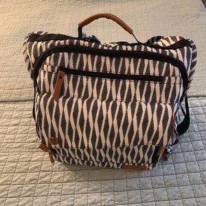 Diaper bag in the style of jujube bff.